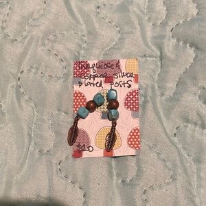 Turquoise and Brown Beaded Earrings with Feather Charms
